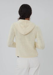 person wearing still here new york womens Bear Zip Up in Cream