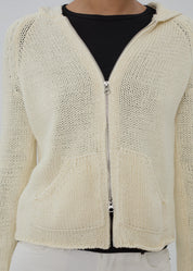 person wearing still here new york womens Bear Zip Up in Cream