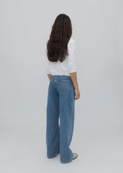 person wearing still here new york womens Cool Jean in Classic Blue