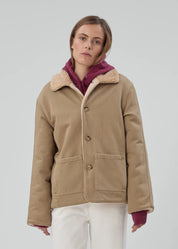 person wearing still here townes jacket reversible sherpa