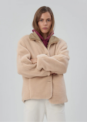person wearing still here townes jacket reversible sherpa