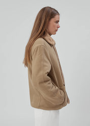 person wearing still here townes jacket reversible sherpa