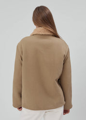 person wearing still here townes jacket reversible sherpa