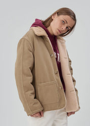 person wearing still here townes jacket reversible sherpa