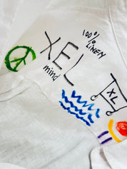 xelkom unisex One-of-a-Kind Linen Workshirt in White & Purple embroidery