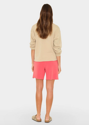 person wearing xirena Rocco Terry Sweatshort in vintage red