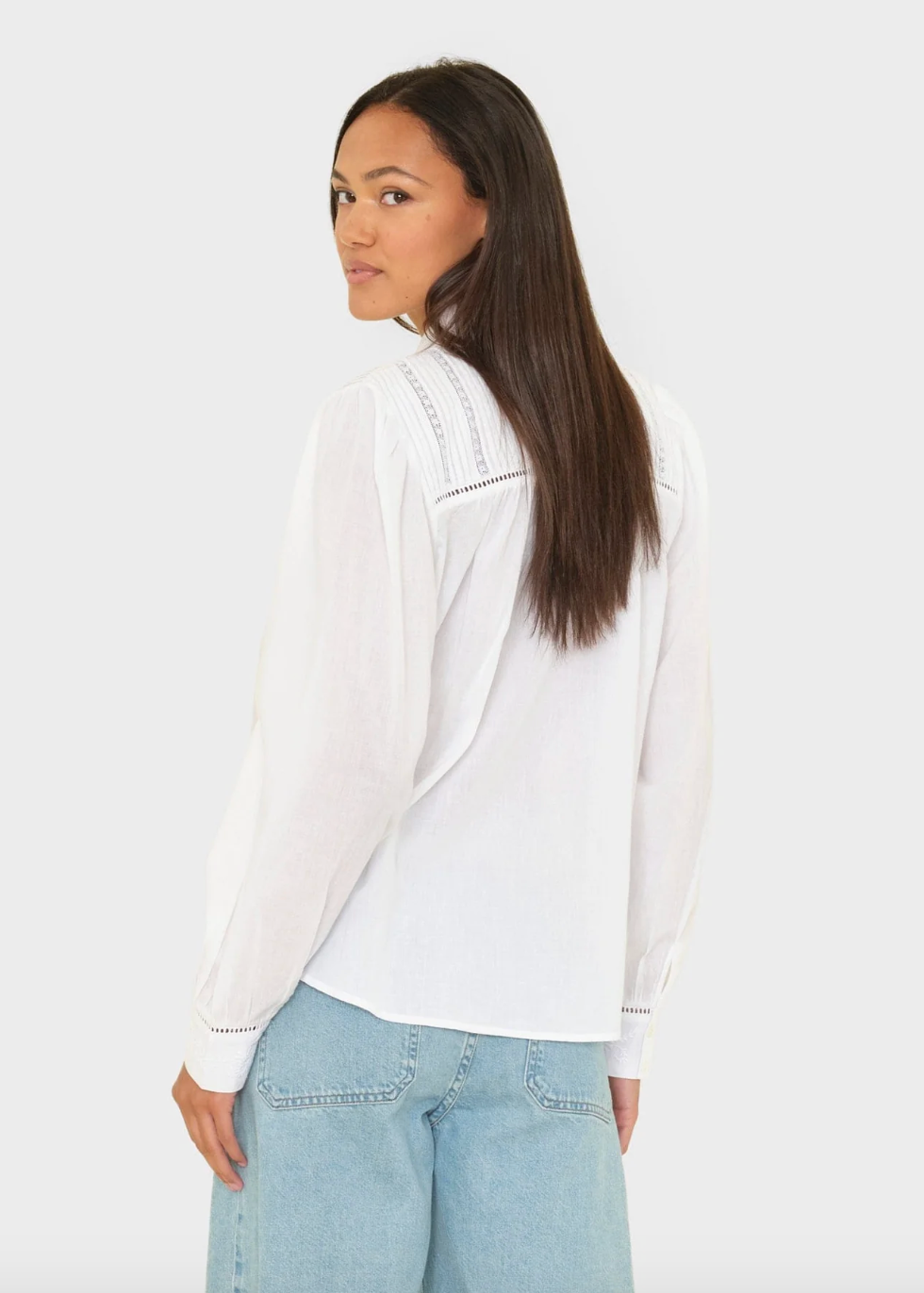 person wearing xirena Viviana Shirt in White