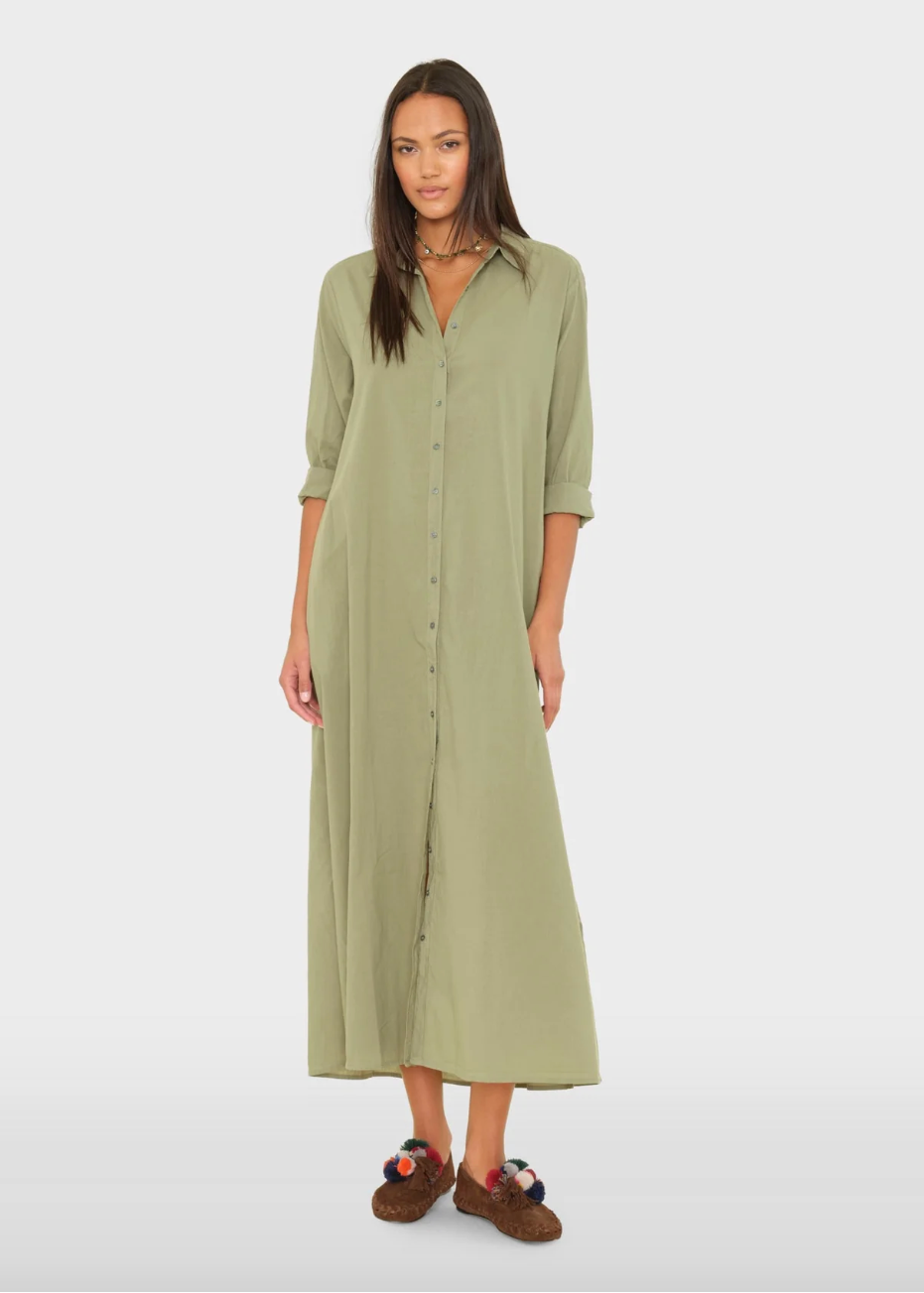 person wearing xirena womens Boden Dress in Dark Seagrass