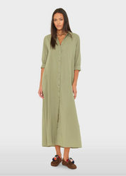 person wearing xirena womens Boden Dress in Dark Seagrass