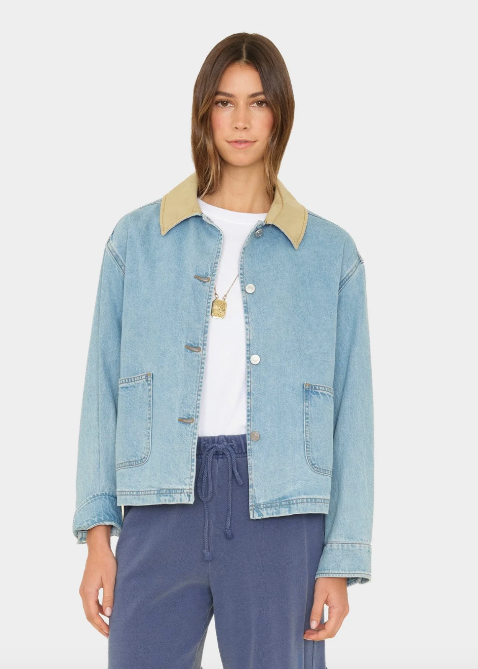 person wearing xirena womens Cove Denim Jacket in Blue Cloud