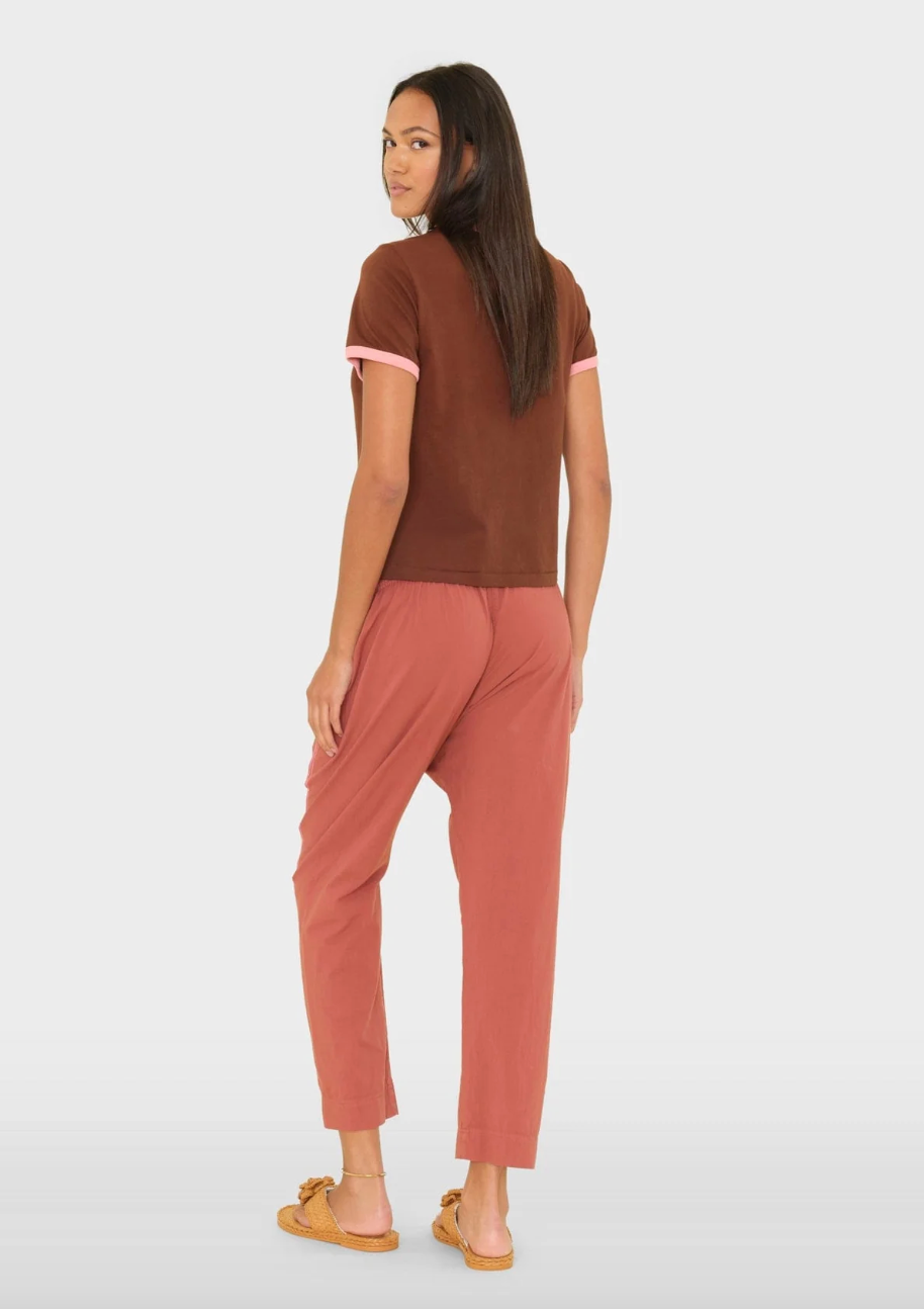 person wearing xirena womens Draper Pant in Cinnabar