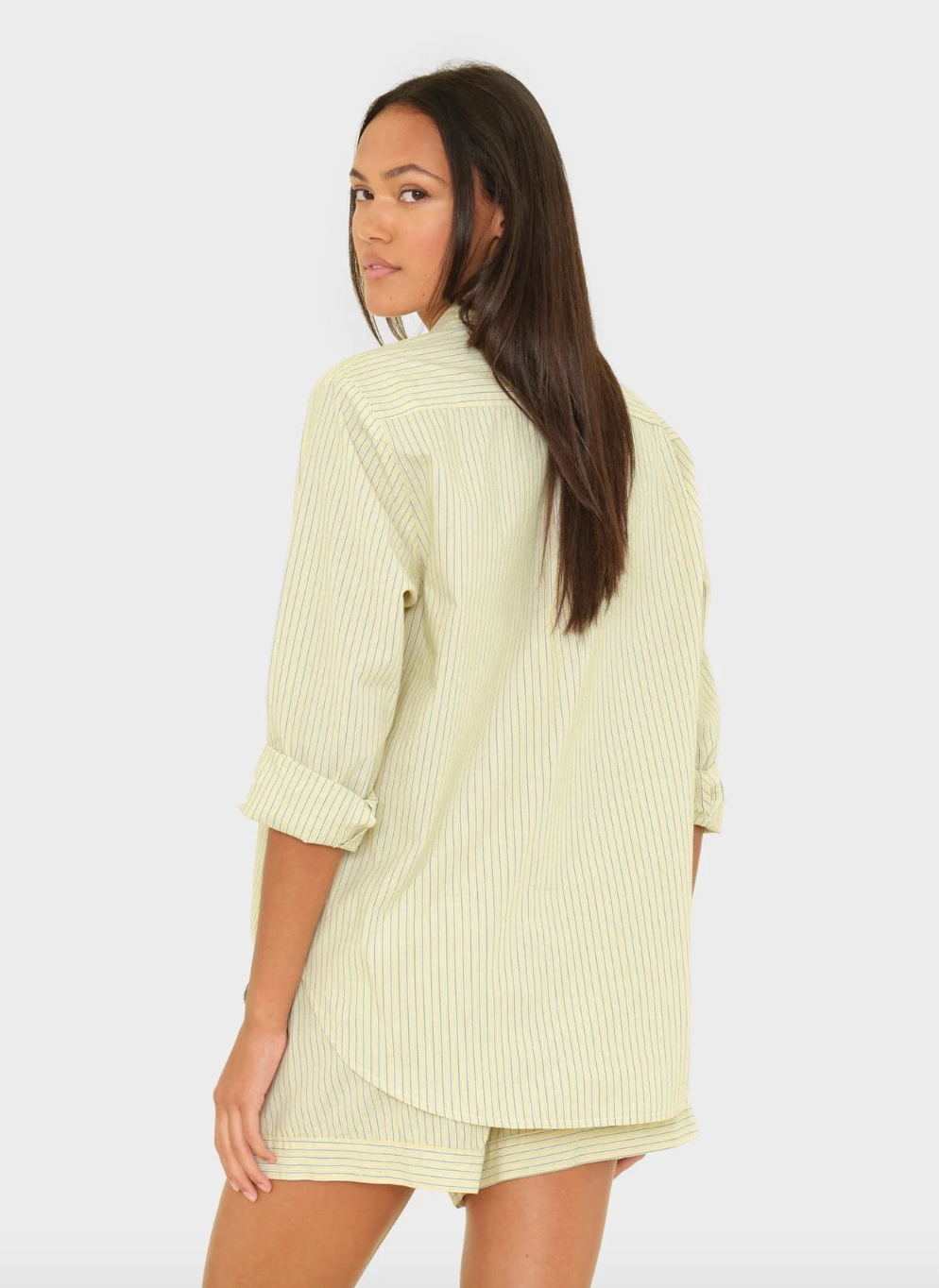 person wearing xirena womens cotton Beau Shirt in Citrine Stripe
