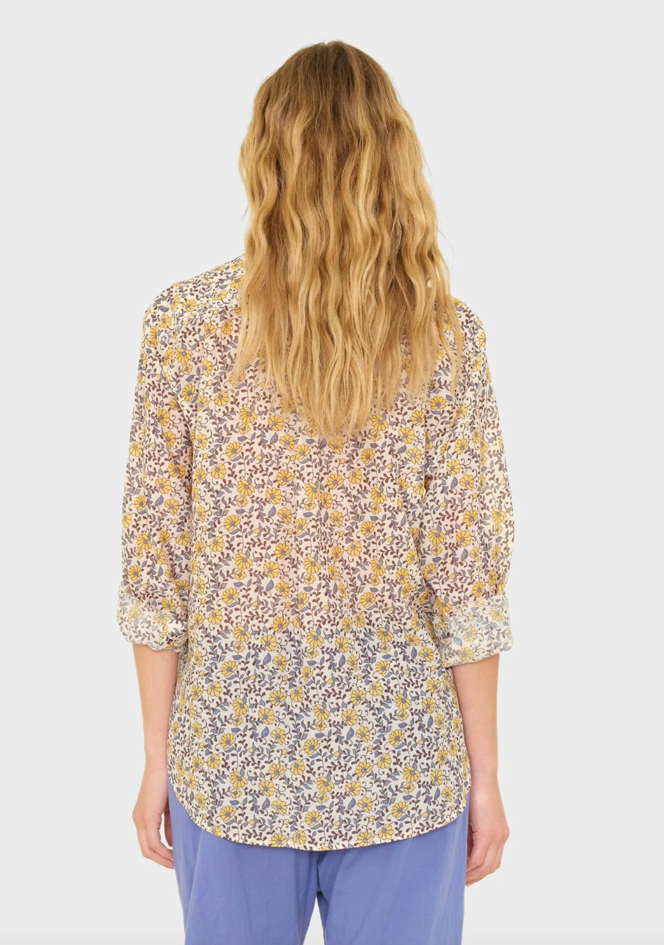 person wearing xirena womens printed Beau Shirt in Sun Petals