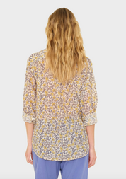 person wearing xirena womens printed Beau Shirt in Sun Petals